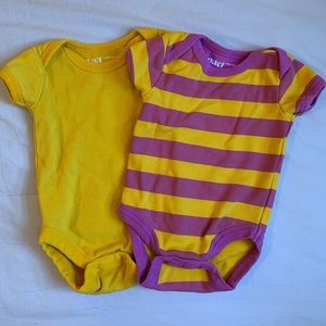 Pact onesies
